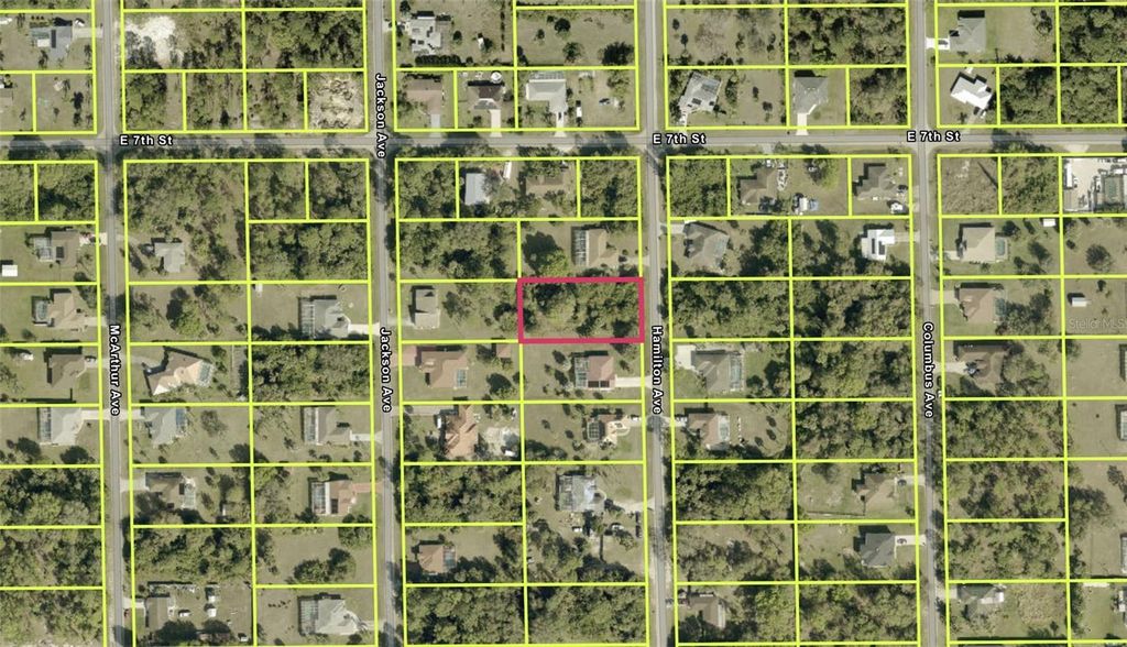 Photo of 619 Hamilton Avenue, Lehigh Acres, FL 33972 (MLS # GC535899)