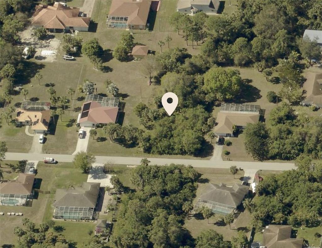 Photo of 619 Hamilton Avenue, Lehigh Acres, FL 33972 (MLS # GC535899)