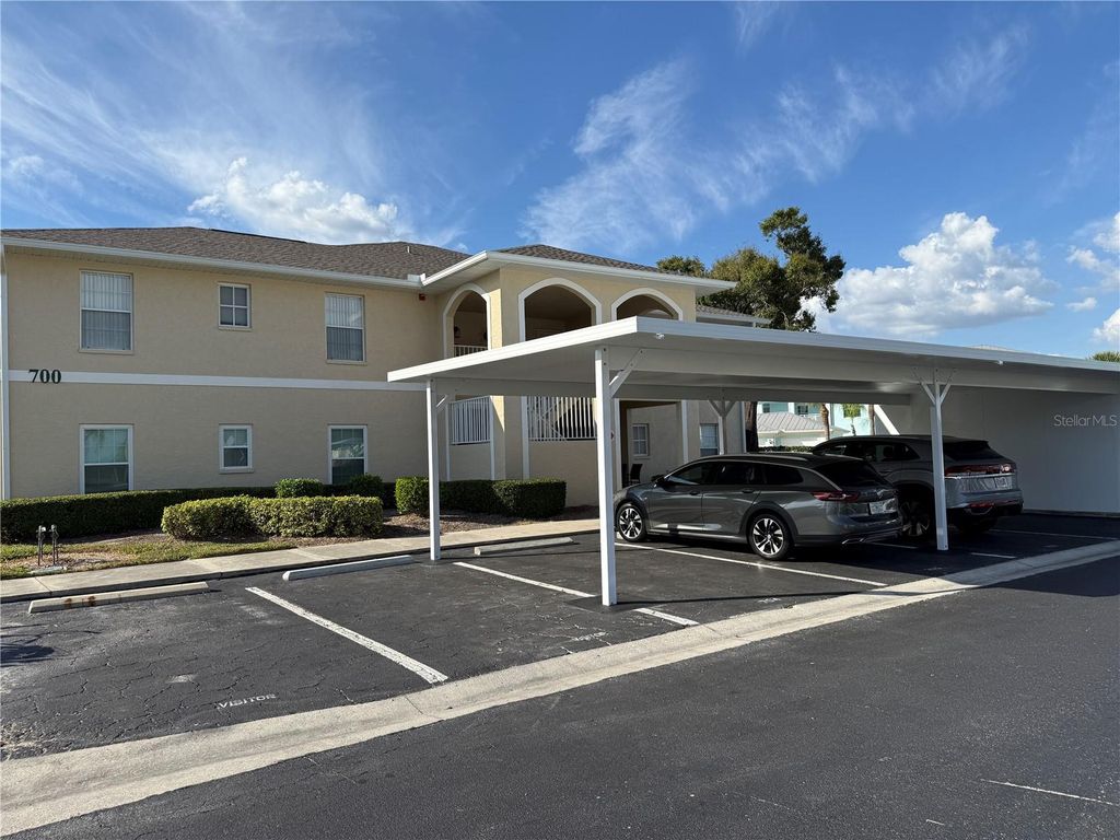 Photo of 5800 Sabal Trace Drive #701, North Port, FL 34287 (MLS # C7518603)