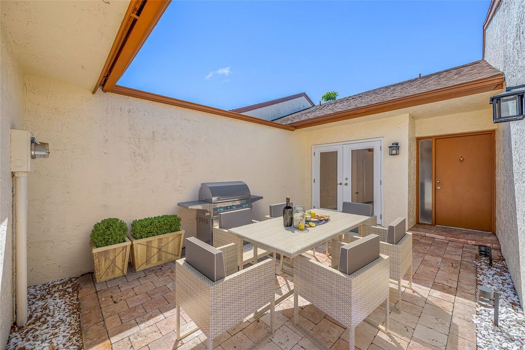 Photo of 14778 Feather Cove Road, Clearwater, FL 33762 (MLS # TB8480292)