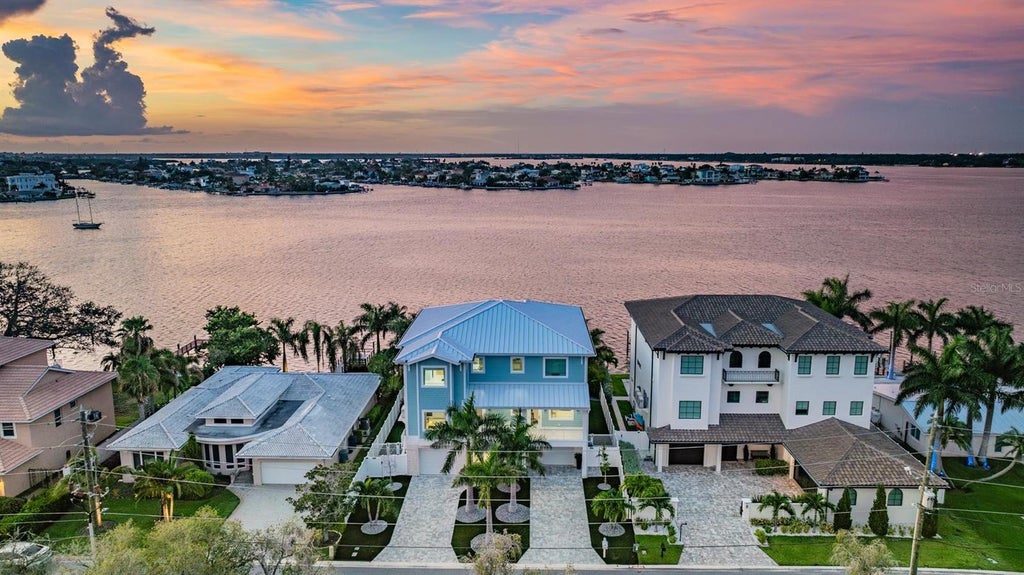 Photo of 7 Paradise Lane, Treasure Island, FL 33706 (MLS # TB8553225)