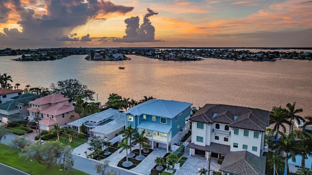 Photo of 7 Paradise Lane, Treasure Island, FL 33706 (MLS # TB8553225)