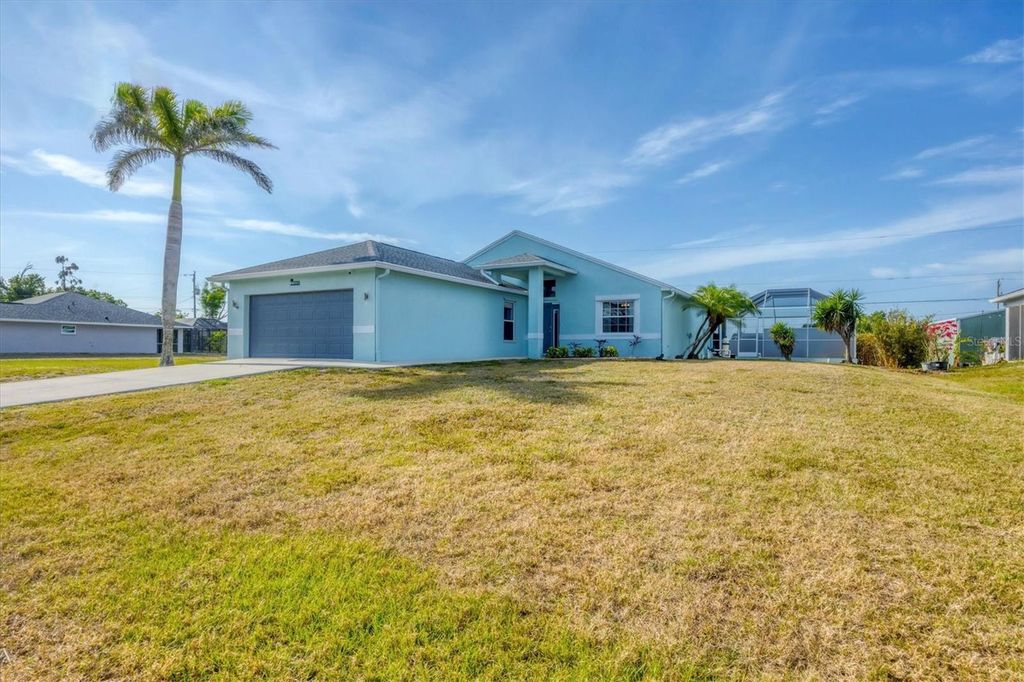 Photo of 12359 Deepwoods Avenue, Port Charlotte, FL 33981 (MLS # D6146996)