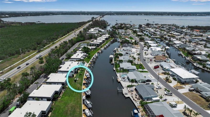 Attention Boaters and Coastal Lovers! Are you dreaming of the perfect coastal lifestyle? Come discover one of Bradenton’s best-kept waterfront secrets! Nestled along a Saltwater Canal with NO Fixed Bridge access directly to Palma Sola Bay and the Intracoastal Waterway, this beautifully updated maintenance-free condo located in the desirable boating community of Flamingo Cay is your dream come true. Step inside this immaculately maintained home and experience the charm of coastal living. The gourmet Kitchen showcases Quartz Countertops, Solid Wood Cabinetry, and Stainless Steel Appliances. Throughout the home, Ceramic Tile flooring is tastefully complemented by neutral tones and crown molding in the Living and Dining Rooms. Relax in the enclosed, climate-controlled Florida Room, where you’ll be treated to breathtaking sunsets and gorgeous waterfront views. The spacious Master Suite includes an EnSuite Bathroom and private access to the Florida Room. The Guest Bath features a curbless walk-in shower and wall-mounted sink, designed with accessibility and style in mind. The second bedroom offers versatility, perfect for guests, a home office, or both. A convenient interior laundry closet with stackable washer and dryer adds ease and functionality. Step outside and you’re just feet from your private assigned Boat Dock, complete with an 8,000 lb. Boat Lift, ready for you to cruise to some of the area’s best boating and fishing destinations. Additional highlights include Impact Windows and Doors, a Covered Carport and Oversized Exterior Storage Room, a Heated Community Pool overlooking the canal and Recreational amenities including Pickleball, Basketball, and Shuffleboard. Monthly fees include Flood Insurance, Internet and Cable, Lawn Maintenance, and more. Ideally located just minutes from the Gulf Beaches of Anna Maria Island, the scenic trails of Robinson Preserve, and an array of popular shops and restaurants. This beautiful property is a boater’s paradise and priced to sell quickly, don’t hesitate and schedule your private showing today!
