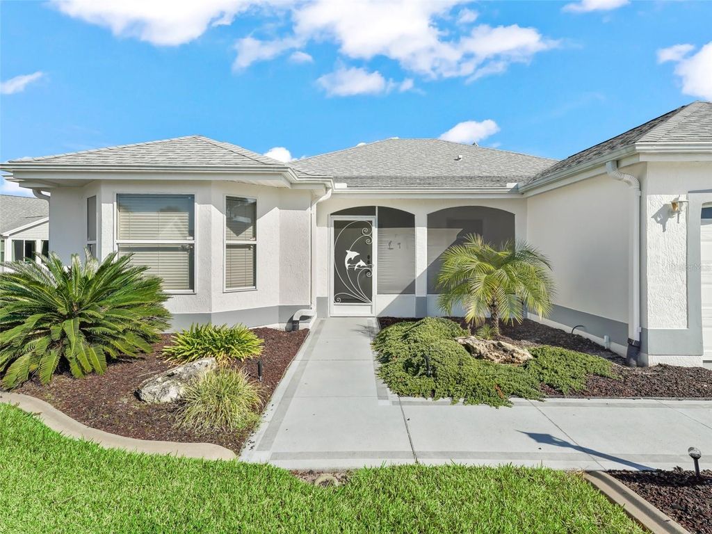 Photo of 1103 Chaparral Drive, Lady Lake, FL 32159 (MLS # OM705062)
