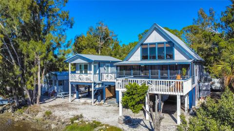Photo of 16490 SW Indiana Avenue, Cedar Key, FL 32625 (MLS # W7872769) Photo of 16490 SW Indiana Avenue, Cedar Key, FL 32625 (MLS # W7872769)
