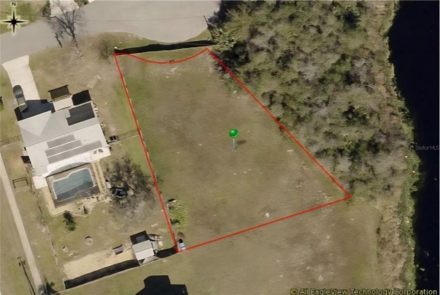 Discover the perfect blend of space, privacy, and natural beauty with this expansive 0.35 lot nestled in a tranquil cul-de-sac. Tucked away from traffic, the property offers the peace and quiet of a private retreat while still being conveniently close to local amenities, schools, shopping, and dining. Enjoy serene water views that create a picturesque backdrop for your future home, adding both charm and value to the property. Whether you envision a modern family residence, a vacation getaway, or a smart real estate investment, this lot offers endless possibilities. With its generous size, desirable location, and stunning surroundings, this property is more than just land—it’s the foundation for your future. Don’t miss the chance to secure this rare opportunity to build in one of Florida’s most inviting settings.