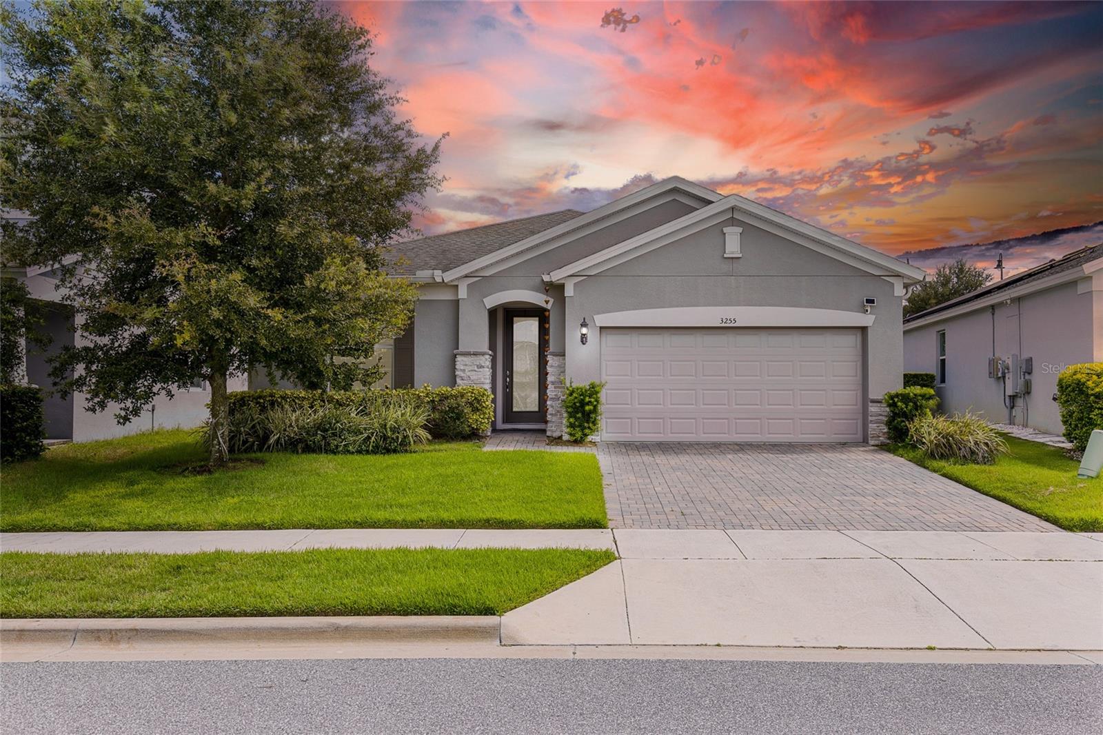 Why wait for new construction when you can move right into this like-new 2020 Pulte home? Thoughtfully designed with modern finishes, a private office, and NO REAR NEIGHBORS, this Winter Garden gem blends open living with quiet retreat, all in one of Central Florida’s most desirable communities.
Step inside and you’re welcomed by upgraded ceramic tile flooring that flows seamlessly through the open-concept main living areas, creating a bright, airy feel. Just off the foyer, a versatile office offers the perfect space for working from home, studying, or even a creative hobby room.
At the heart of the home, the kitchen stands out with sleek quartz countertops, stainless steel appliances, a stylish tile backsplash, and a spacious walk-in pantry. The oversized island is both functional and inviting, making it easy to serve meals, host game nights, or simply enjoy casual conversations while cooking. The adjoining dining and living areas are filled with natural light, providing an open, welcoming space for gatherings big or small.
The primary suite offers a private retreat with soft carpet underfoot, a generous walk-in closet, and a spa-inspired bathroom featuring dual quartz vanities and a walk-in shower. Two additional bedrooms and a full bathroom with modern finishes provide comfort and flexibility for family or guests. A thoughtfully designed laundry room with built-in shelving adds extra convenience and storage.
Out back, a covered patio invites you to start your mornings with coffee or end your evenings unwinding outdoors. With plumbing already installed, it’s ready for your dream outdoor kitchen. The fenced backyard offers both privacy and room to entertain, garden, or simply enjoy the Florida sunshine.
Set within the sought-after Lakeview Preserve community, you’ll enjoy resort-style amenities including a pool, fitness center, kayak launch, and playground—all with a low HOA. The location is just minutes from Horizon West, the shops and dining of Downtown Winter Garden, and major attractions like Disney and Universal. With excellent schools nearby, this home is ideal for relocation to Orlando or as a long-term investment in Central Florida real estate.
Don’t wait for a builder’s timeline—this MOVE-IN READY home is waiting for you now. Contact us today to schedule your private tour today!