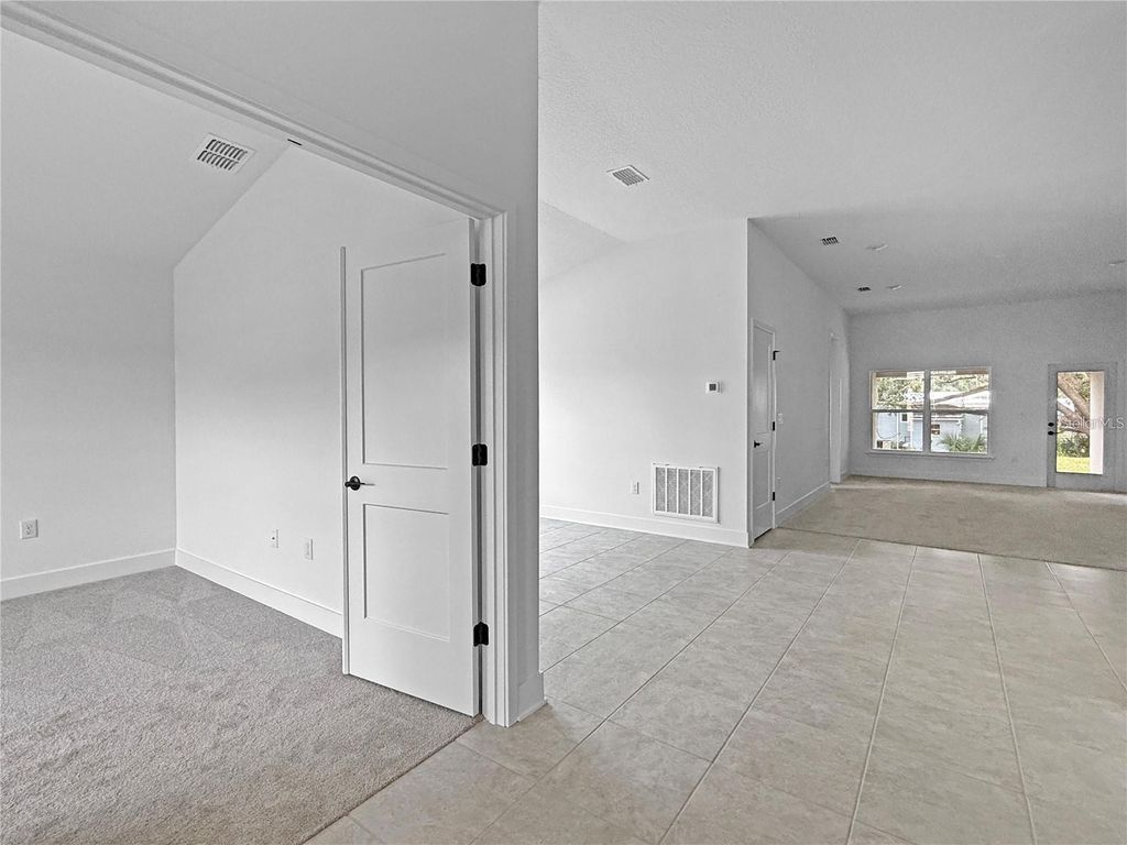 Photo of 1654 Ann Rose Way, Leesburg, FL 34748 (MLS # O6422970)