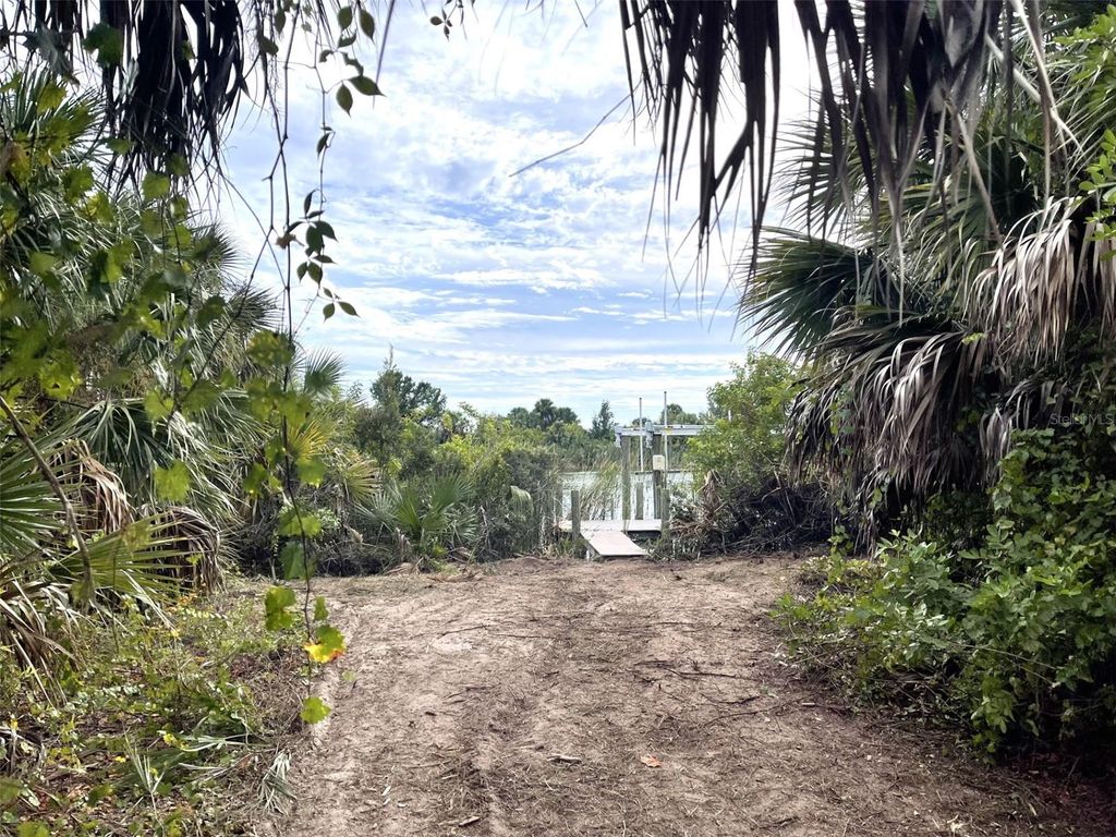 Photo of 13281 Longville Avenue, Port Charlotte, FL 33981 (MLS # N6141294)