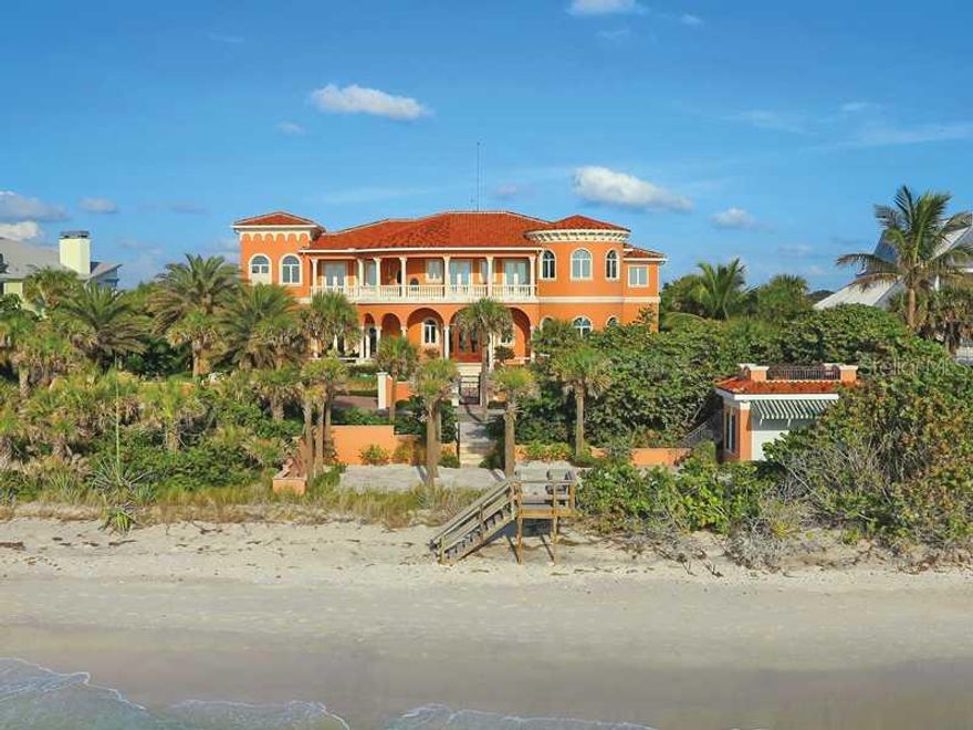 Casa Al Mare is the epitome of classical Italian architecture in its most refined form. Architect Thorning Little designed this gulf-to-bay masterpiece with the owners who traveled the world hand-selecting materials. Situated in the coveted stretch of Casey Key that has the deepest boating water,this home was built in 2010. With 230' of gulf frontage, a beach cabana with rooftop deck, 114+/- ft of bay frontage, a boathouse for storing kayaks, & private dockage for a large vessel, the property is unique on Casey Key. Upon entering, the sight lines draw you into the formal living area's groin vaulted colonnade out to the large terrace and pool with marble fountain with the open bay beyond. Amenities include internet accessible Lutron lighting, HVAC & security system; backlit onyx, granite and marble bath and kitchen counters; brick paver motorcourt leading to 4 car garage; marble columns & fireplaces; beamed vaulted ceiling; 2 master suites, 4 guest suites,  a master wing that exudes a spa-like experience with beautifully appointed his/her baths and dressing areas, with gulf and bay vistas from the entire wing, a spiral stairway leads from master balcony to pool and spa. Casey Key is an 8-mile island with fewer than 400 single family homes; with no traffic lights, no high rise condominiums. Located within minutes of the historic walking town of Venice, The Oaks Country Club, and 15 miles south of the cultural mecca of downtown Sarasota, Casey Key is a special place to call home.
