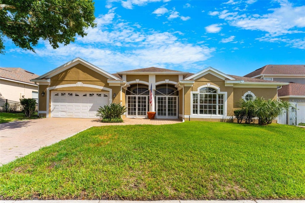 Photo of 426 Palm Crest Lane, Lake Mary, FL 32746 (MLS # O6436020)