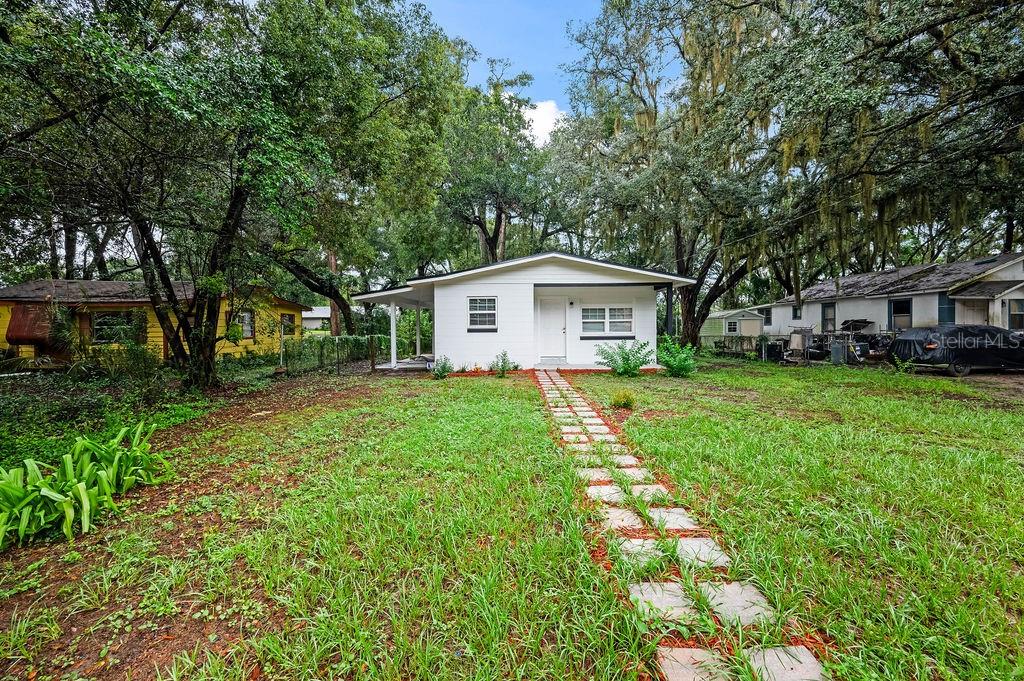 Photo of 4737 Halliday Lane, Orlando, FL 32810 (MLS # W7890218)