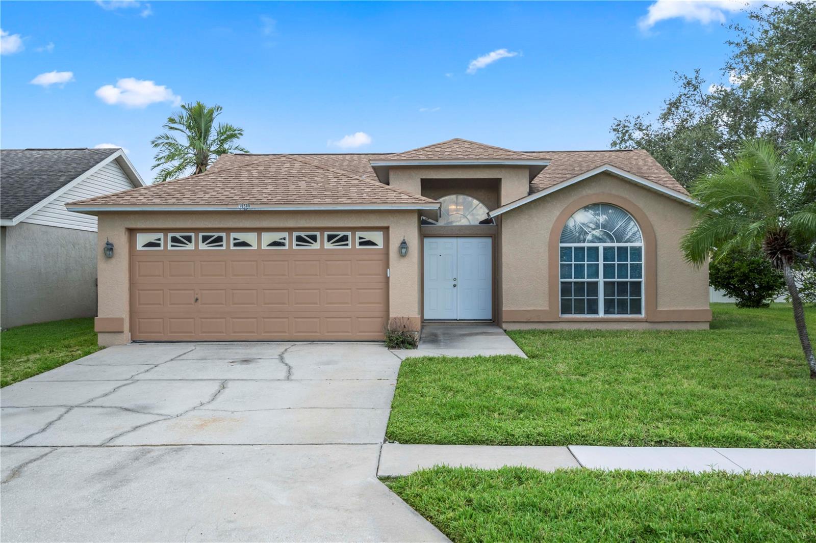 Tucked away in the highly desirable Waterside neighborhood of The Lakes, this 3 bedroom, 2 bathroom pool home offers a rare opportunity to bring your vision to life. Solidly built and well-loved, it’s ready for a modern refresh — but with great bones, soaring ceilings, and an ideal floorplan already in place, the foundation for your dream home is all here.
Double front doors open to a spacious foyer and light-filled living room, where tall ceilings and views of the sparkling pool set the tone for what could be an incredible indoor-outdoor living space. The kitchen offers generous cabinet and counter space, a closet pantry, and a cozy eat-in nook—perfect to update into a true entertainer’s hub. A separate dining room with bay windows adds character and flexibility.
The oversized owner’s suite features a walk-in closet and private ensuite bath, while the guest bedrooms are well-proportioned with a full bath conveniently close by. An indoor laundry room adds everyday functionality.
Step outside to the screened-in lanai complete with inground pool and spa—just waiting to be revitalized into the ultimate backyard retreat.
With low annual HOA fees, no CDD, and no flood zone, the value here is undeniable. Waterside at The Lakes offers tennis and pickleball courts, a playground, and scenic nature paths with gazebo and water views. Nearby Roosevelt Wetlands flaunts over 100 species of birds and wildlife along newly added walking trails.
Centrally located near Mainlands Golf Course, Freedom Lake Park, Bill Jackson’s Shop for Adventure, Gulf beaches, shopping, dining, fitness centers, Helen Howarth Park, I-275, and both St. Pete/Clearwater and Tampa International Airports—this home combines potential, location, and lifestyle in one unbeatable package.
Bring your creativity and make it shine—this is the Florida home you've been waiting to transform!