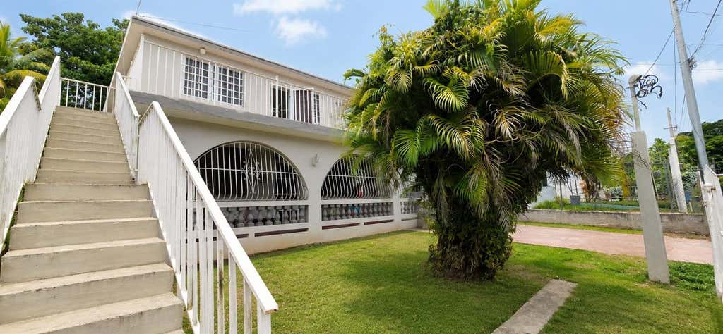 Photo of 10 Parcelas Vanscoy, Bayamon, PR 00957 (MLS # PR9122688)