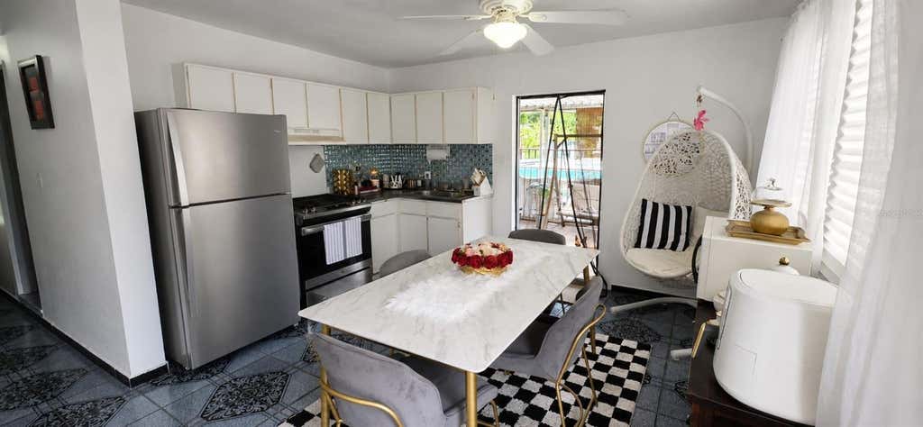 Photo of 10 Parcelas Vanscoy, Bayamon, PR 00957 (MLS # PR9122688)