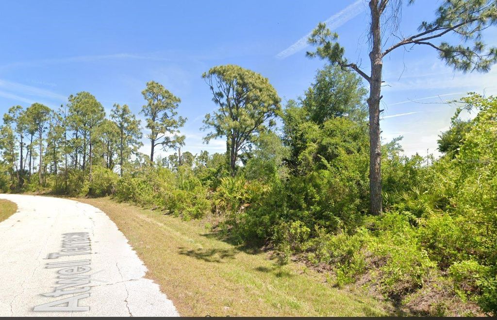 Photo of 7404 Atwell Terrace, Port Charlotte, FL 33981 (MLS # C7512751)