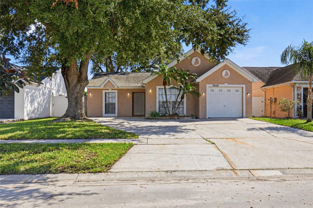 Photo of 9006 Dixiana Villa Circle, Tampa, FL 33635 (MLS # O6443567)