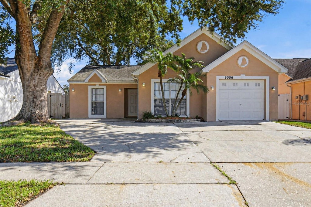 Photo of 9006 Dixiana Villa Circle, Tampa, FL 33635 (MLS # O6443567)