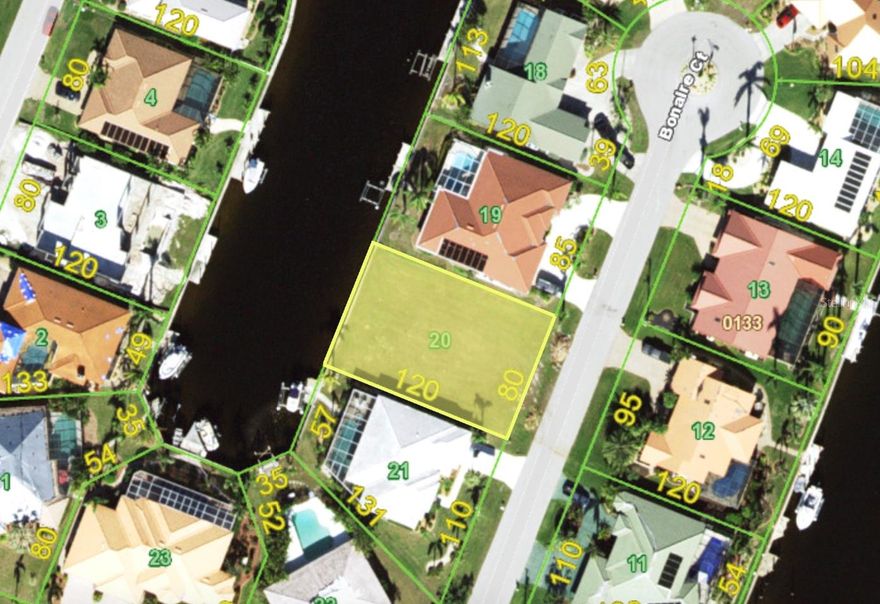 Calling all Boaters! Experience the ultimate Florida lifestyle on this stunning waterfront homesite in Punta Gorda Isles with fast sailboat or powerboat access! Boasting 80' of water frontage, this lot provides ample space for a large dock and a custom luxury pool home. Located on a wide, deep-water canal, you are just a short boat ride away from the open waters of the Gulf. This community offers a unique blend of elegance and leisure, with miles of walking paths, proximity to downtown Punta Gorda’s historic district, and sunset views that never get old. All city utilities are available at the site. City-maintained seawall included!