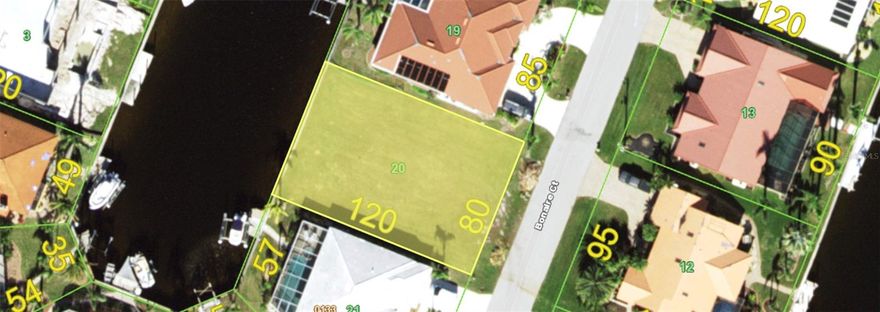 Calling all Boaters! Experience the ultimate Florida lifestyle on this stunning waterfront homesite in Punta Gorda Isles with fast sailboat or powerboat access! Boasting 80' of water frontage, this lot provides ample space for a large dock and a custom luxury pool home. Located on a wide, deep-water canal, you are just a short boat ride away from the open waters of the Gulf. This community offers a unique blend of elegance and leisure, with miles of walking paths, proximity to downtown Punta Gorda’s historic district, and sunset views that never get old. All city utilities are available at the site. City-maintained seawall included!