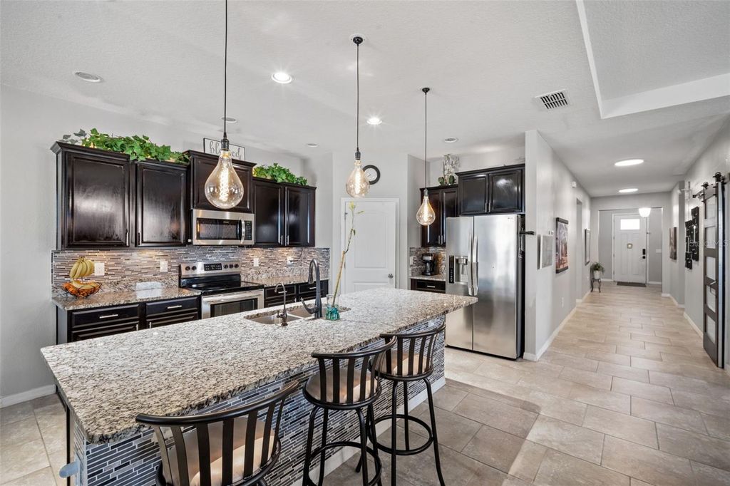 Photo of 1941 Partin Terrace Road, Kissimmee, FL 34744 (MLS # O6386096)