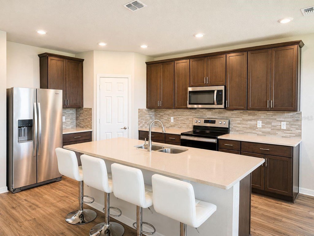Photo of 196 Towns Circle, Haines City, FL 33844 (MLS # O6428208)