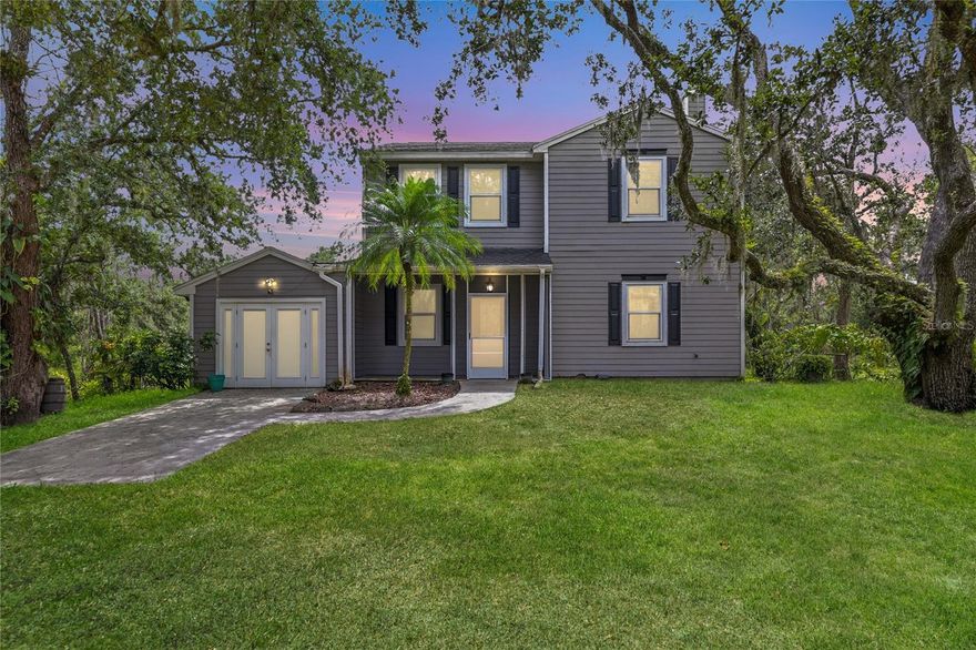 Welcome to your private Florida sanctuary, a serene escape with effortless access to urban life. Tucked away on 2.23 acres of lush, natural landscape, but just minutes to Lakewood Ranch, this 3-bedroom, 2.5-bath residence offers the perfect blend of refined living and serene seclusion. The tranquil creek winding through the property and native wildlife add to the home’s rare sense of retreat.

Renovated to perfection, the interior showcases sophisticated finishes throughout — including luxury vinyl plank flooring, quartz countertops, and custom built-ins framing an active, stone-clad wood-burning fireplace. The expansive primary suite is a true haven, featuring dual custom-organized walk-in closets and a spa-inspired bathroom with a skylight that bathes the space in natural light.

Outside, the setting is nothing short of breathtaking. Thoughtfully designed spaces invite relaxation and connection to nature — from the fountain-view sitting area and charming footbridge spanning the creek, to the grand patio ideal for alfresco dining or morning coffee amidst the sounds of nature.

Beyond the main home, the property includes three additional structures: two storage sheds and a versatile outdoor workshop featuring two climate-controlled rooms.

Ideally located just ten minutes from Lakewood Ranch, this home harmonizes the tranquility of country living with easy access to modern conveniences. Notable updates include: 2019 impact windows, 2020 roof, 2022 A/C systems, 2024 septic, and 2024/25 well and pump.

If you're looking for a peaceful hideaway that keeps you connected to city energy, this is the perfect home for you.