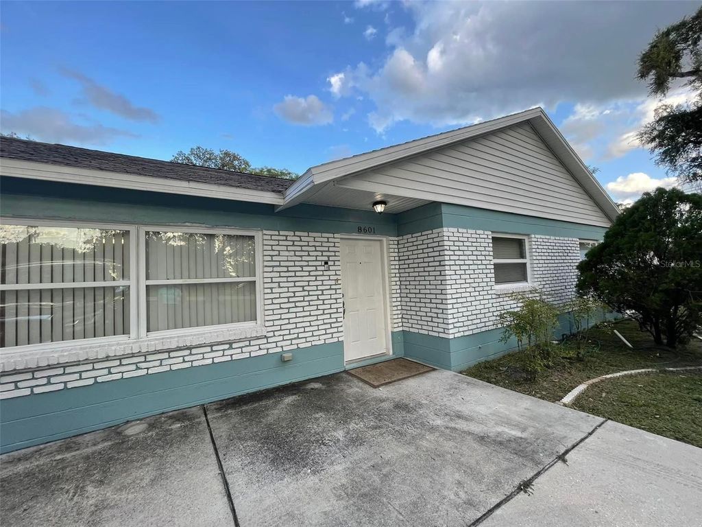 Photo of 8601 Twin Lakes Boulevard, Tampa, FL 33614 (MLS # TB8328260)