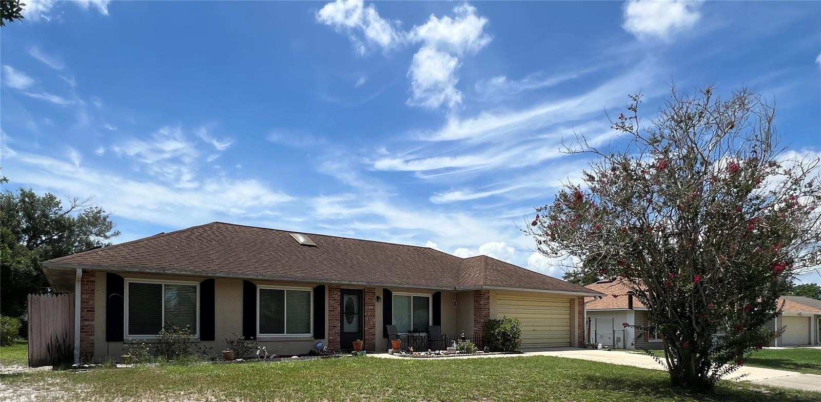 Welcome to this charming 3-bedroom, 2-bathroom home, built in 1990. Featuring vaulted ceilings and a skylight, the open living space is filled with natural light. The Primary Bedroom offers wood-look tile flooring and an en suite bathroom.
Enjoy year-round outdoor living on the large screened-in back porch, overlooking a partially fenced backyard, complete with two mature avocado trees—perfect for gardening or entertaining. The home has downspouts and gutters, breakfast nook with sliders to the porch and bay window in the dining room.
This home is packed with upgrades, including, new double-pane thermal vinyl windows (2025) rated for up to 195 mph winds, solar panels, shingle roof (2015), Goodman HVAC (2021), and 350 square foot drain field (2021)—providing peace of mind and energy efficiency. Also, replaced kitchen cabinets with some soft close drawers and replaced countertops (2022 from RCS Custom Kitchens), newer tile floors (2022), electric panel upgraded (2025), gooseneck kitchen faucet and tiled backsplash (2022), new front door (2020). Electric water heater (2015).
Don’t miss this move-in ready gem with timeless charm & modern updates!