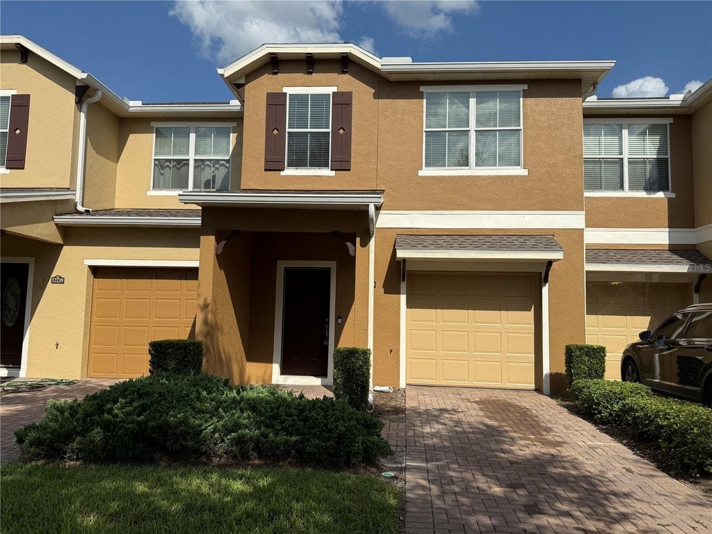 Photo of 12243 Citruswood Drive, Orlando, FL 32832 (MLS # O6428187)