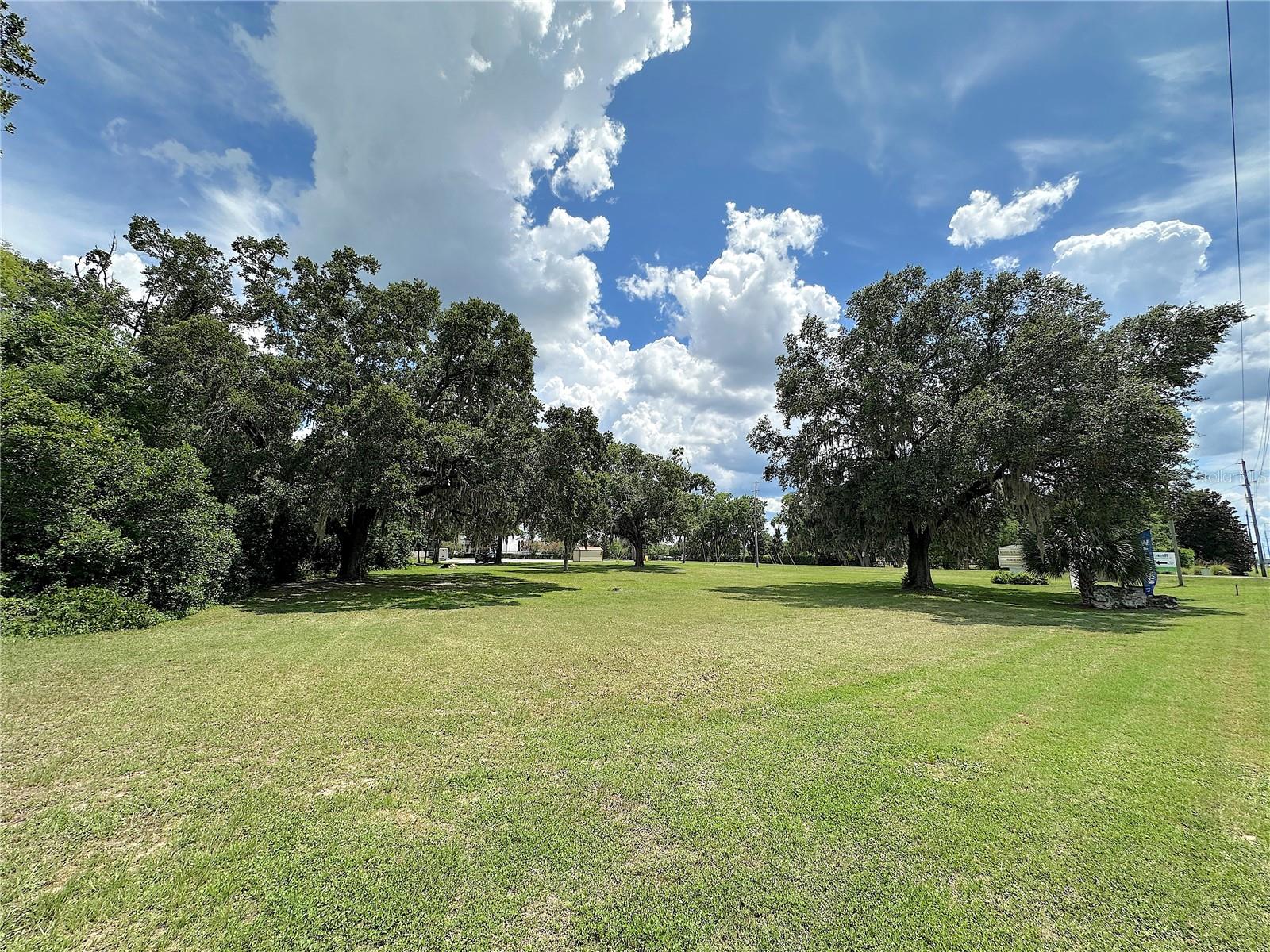 This outstanding development opportunity sits at the corner of SW Archer RD and SW 75th TERR. It is inside the Urban Service Area and is located in the Tower Rd Activity center offering a multitude of potential future, development options. It has over 240 ft of frontage on SW Archer Rd, has an average daily traffic count of 22,500 vehicles and is conveniently located across the street from 2, large multi-family developments, near a Publix anchored shopping center and adjacent to a UF Health ER. The area boasts some of the highest household income in Alachua County and is just west of a variety of retailers and restaurants. LOT DIMENSIONS ARE ESTIMATES AND SHOULD BE VERIFIED
