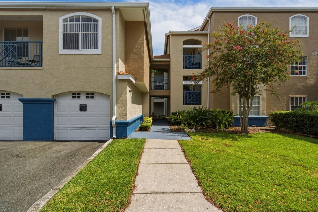 Photo of 7300 Westpointe Boulevard #725, Orlando, FL 32835 (MLS # O6443947)