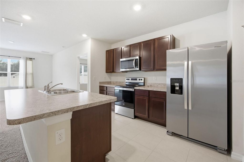 Photo of 3865 SE 98th Place, Belleview, FL 34420 (MLS # OM714826)