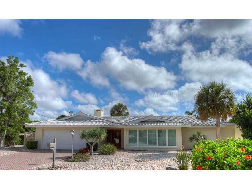 Sprawling 4 bed. plus Waterfront/Pool/Spa home is only 4 min. to World famous Siesta Key Beach!!!Tucked away on the little "island "of Azure Way you are afforded privacy with water views . Perfect for large and/or multiple families and guests who want to enjoy either the pool or the beach without getting in the car! A brand new beautiful granite topped Kitchen space opens to a family room all surrounded by the gorgeous pool ,spa and water views out back . This home boasts 2 Master suites each with a King bed and private ensuite bath, guest room and full bath with pool access ..A large guest room with 2 sets of bunk beds ,private bath and den with sleeper are on the other side of the home separated by a large Great room/Dining room . Home has been recently remodeled so Kitchen is brand new. Room galore and beautiful views. 
 Call for off-season rates and availability. Please BE AWARE that if you see this property on CRAIGSLIST ..it is a scam