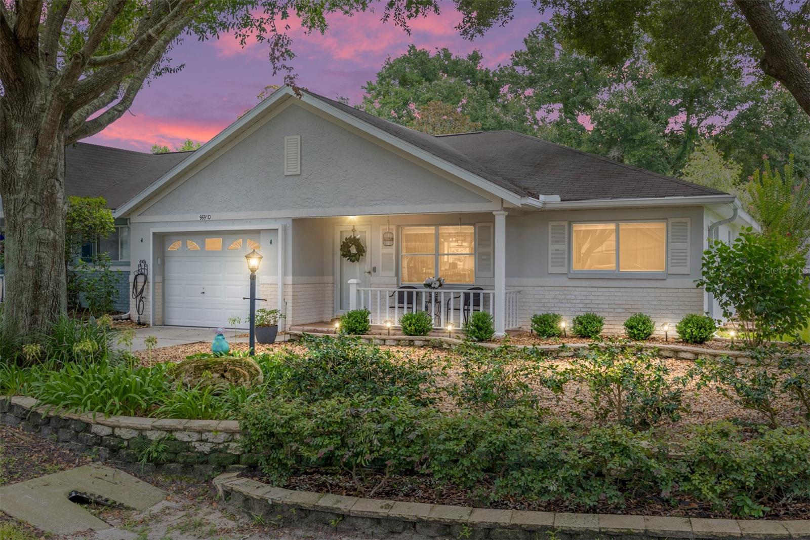 Re-listed and re-freshed, clean and cozy Delphina model, END UNIT villa available in Crescent Ridge of On Top of The World, Ocala. This charming villa boasts gorgeous luxury vinyl plank flooring and freshly painted interior. The kitchen has been completely updated with stainless steal appliances and quality soft close cabinetry and extends to a lovely eat-in breakfast nook that leads to the relaxing enclosed lanai. 2024 washer and dryer do convey. This home is move-in-ready and perfect for our snow-birds or permanent Florida residents. On Top of The World is a 55+ master-planned retirement community with unmatched amenities and has golf cart accessibility to shopping centers that include everything from grocery stores, restaurants, entertainment and even accessibility to healthcare. Don't miss out on this lovely priced-to-sell gem... call to schedule your private showing today!