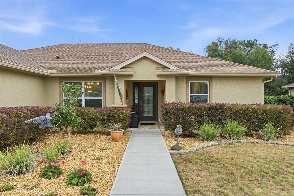 Photo of 3125 N Canterbury Lake Drive, Hernando, FL 34442 (MLS # OM717350)