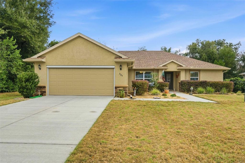 Photo of 3125 N Canterbury Lake Drive, Hernando, FL 34442 (MLS # OM717350)