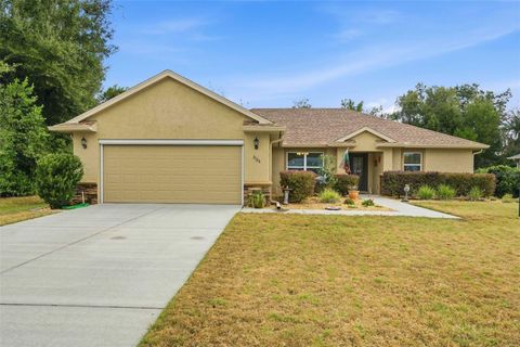 Photo of 3125 N Canterbury Lake Drive, Hernando, FL 34442 (MLS # OM717350)