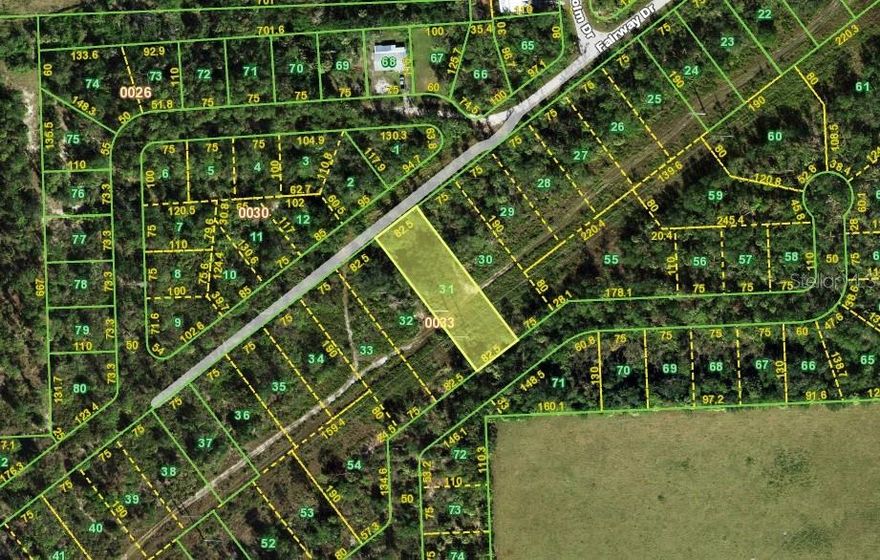 Prime commercial lot located within the Future Airport Commerce Park District (ECAP), offering one of the rarest and most flexible zoning designations in Punta Gorda. ECAP zoning allows a wide variety of commercial, industrial, and hospitality uses including retail, offices, restaurants, manufacturing, contractor yards, hotels, motels, pet resorts, truck parking, and more. This property is strategically positioned near the I-75 exit, providing quick access between Naples and Tampa—an ideal location for logistics and service-based businesses. Punta Gorda Airport (PGD) is just minutes away, with major growth underway and a newly completed FedEx distribution hub nearby. With Babcock Ranch to the east and the Peace River to the north, this site offers exceptional visibility, access, and long-term investment potential in a rapidly expanding Southwest Florida market.