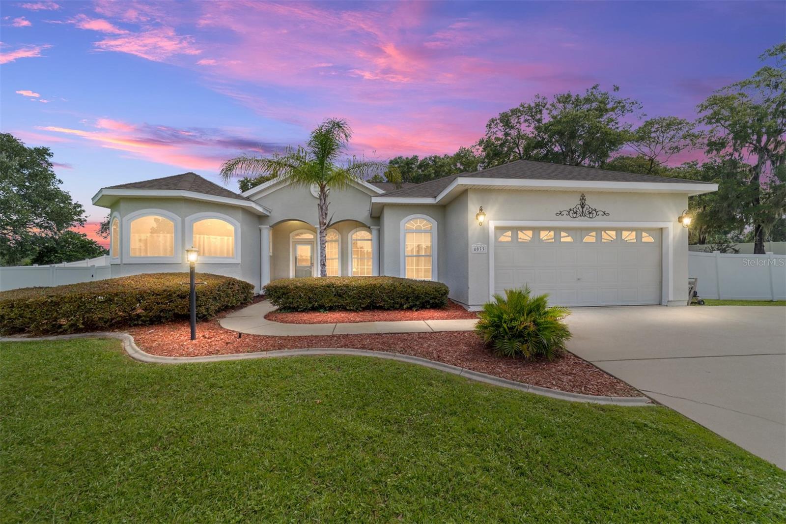 ROOF 2023, ROOF 2023, POOL ENCLOSURE 2023, SOLAR POOL HEATER 2020. Located in a quiet cul-de-sac within a desirable, family-friendly gated community, this beautifully maintained home sits on a large lot and offers the perfect balance of privacy, space, and convenience. This lovely home has split floor plan offering a primary suite with soaking tub, large shower, double sink vanity, walk-in closet. The two additional bedrooms are spacious with guest bathroom offering shower/tub combo, the kitchen is a cooks delight with plenty of counter space and storage, great room with cozy fireplace, bay window overlooking the pool and a large yard with 3 gated entrances for options to access the huge shed. Have an RV or Boat, they can easily be parked in the backyard for your convenience. With a low monthly HOA fee, this gated community offers peace of mind and a location that provides both privacy and easy access to schools, shopping, and everyday essentials. Come check it out!