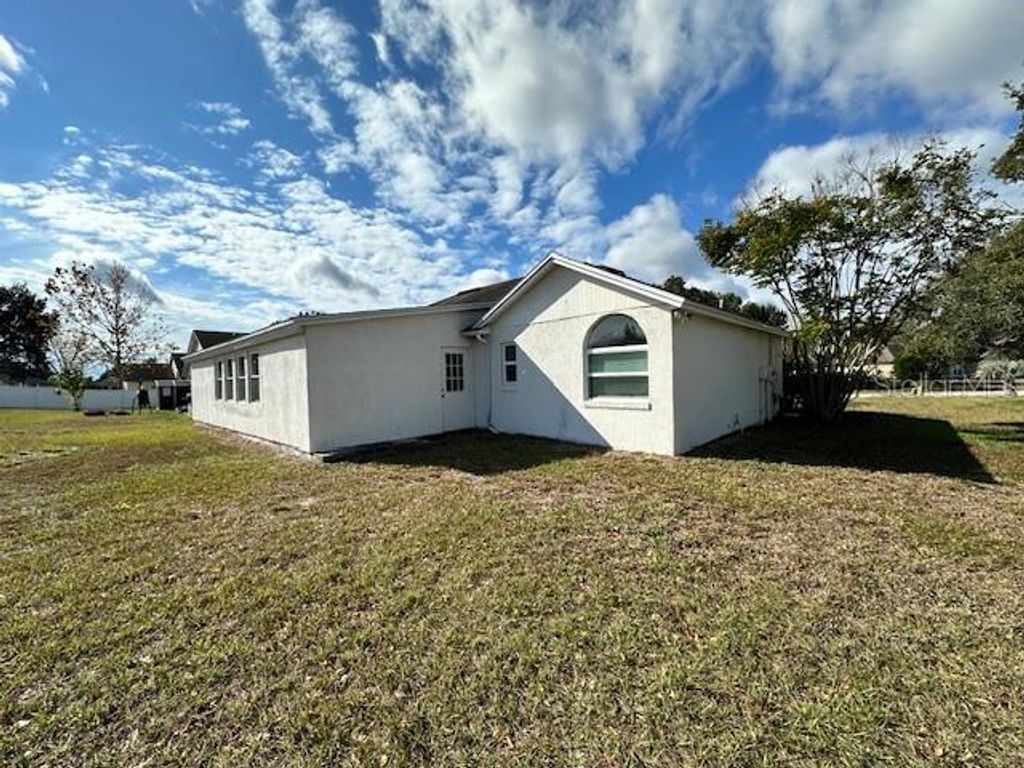 Photo of 233 Via Del Sol Drive, Davenport, FL 33896 (MLS # L4958612)