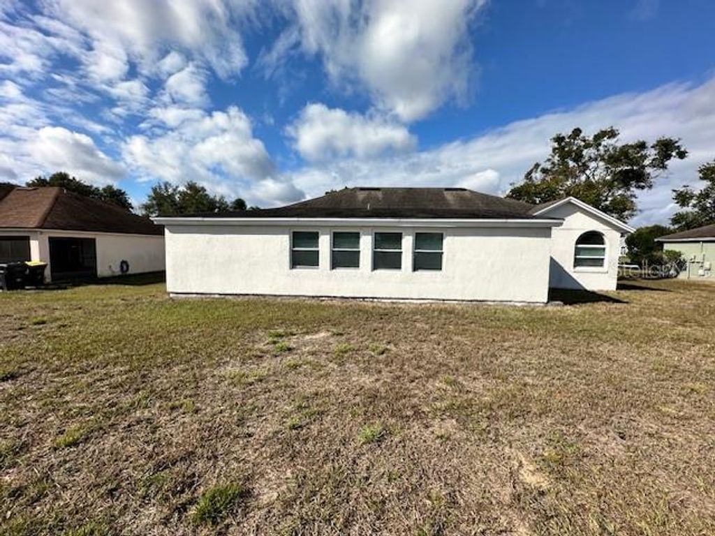 Photo of 233 Via Del Sol Drive, Davenport, FL 33896 (MLS # L4958612)