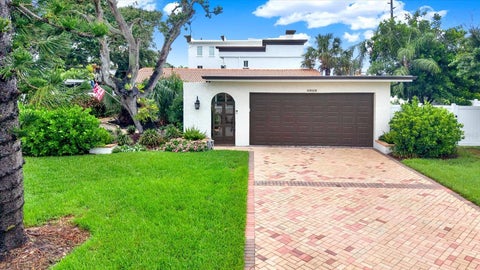 Photo of 1040 Palm Drive, Belleair Beach, FL 33786 (MLS # TB8534927)