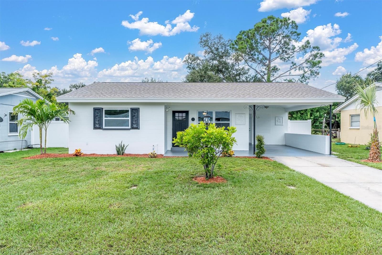 Step inside this fully remodeled 3-bedroom, 1-bathroom block home, where every detail has been thoughtfully updated for comfort, style, and peace of mind. Featuring a brand-new roof (2024), all-new hurricane-rated double-pane windows and hurricane rated doors, and upgraded electrical throughout, this home offers durability and efficiency for years to come. The interior boasts new luxury vinyl plank flooring, fresh interior and exterior paint, and a bright, modern kitchen with all-new stainless steel appliances and granite countertops.
Enjoy the outdoors year-round in the spacious covered and screened lanai, overlooking a beautifully manicured lawn enclosed by a new white vinyl fence for privacy. Additional highlights include a new water heater, a 1-car carport, and a storage shed in the backyard for your convenience. This home truly blends move-in-ready charm with modern upgrades—perfect for easy Florida living!
Centrally located near abundant shopping and dining, this property is just 15 minutes to the Gulf Beaches and 15 minutes to vibrant Downtown St. Pete, offering the best of both coastal relaxation and city convenience.