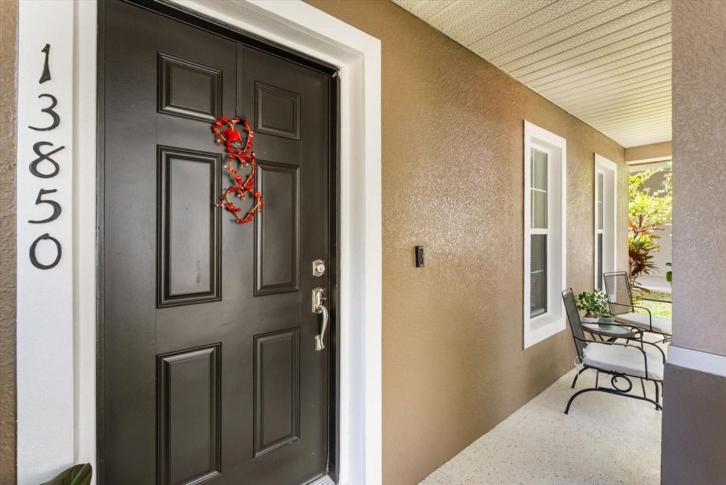 Photo of 13850 Carolina Laurel Drive, Orlando, FL 32828 (MLS # V4946967)