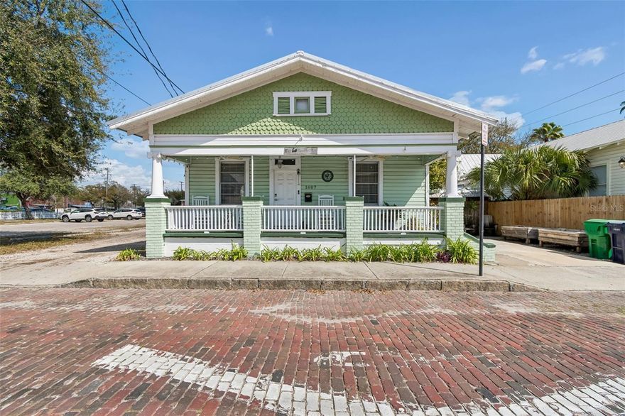 Welcome to the heart of historic Ybor City — where charm, character, and opportunity come together in this BEAUTIFUL IMMACULENT BUNGALOW-STYLE HOME/or business opportunity.
From the moment you arrive, the LARGE FRONT PORCH WITH ROCKING CHAIRS invites you to slow down and soak in the timeless appeal of this iconic neighborhood. 
Step inside to a bright and welcoming LIVING ROOM with plenty of windows for amazing natural sunlight featuring stunning original woodwork and detailed craftsmanship that truly sets this home apart. The ceiling showcases elegant WOODWORK, which continues into the OVERSIZED DINING ROOM, creating warmth and architectural character throughout the main living spaces. ALL-NEW LUXURY VINYL PLANK FLOORING, FRESH PAINT, and WOOD BLINDS give the home a crisp, updated feel while preserving its historic charm. 1925 Meets 2026.
The STUNNING KITCHEN is a showstopper, complete with QUARTZ COUNTERTOPS, NEWER CABINETRY, and NEWER APPLIANCES including a SUBZERO refrigerator/freezer, FRIGIDAIRE GALLERY stove, TOSHIBA microwave, and FRIGIDAIRE dishwasher. A FULL KITCHEN SET OF SUPPLIES/DISHES ARE INCLUDED, making this property truly move-in or business ready.
This 2-BEDROOM, 1-BATH HOME features a beautifully renovated bathroom with classic WAINSCOTING and modern finishes. EVERYTHING HAS BEEN FRESHLY PAINTED, and the home boasts ALL-NEW FLOORS, A NEWER KITCHEN, AND A NEWER BATHROOM — making it turnkey. For added peace of mind, the owner has had LRE Foundation Repair professionally evaluate and repair the underlying beams and foundation, ensuring the structural integrity of the home has been properly addressed and reinforced.(Permit # BLD-26-0520614) The siding was replaced in 2016. (Permit # BTR-17-0463039) New Metal Roof 2024(Permit # BLC-24-0000210) 3 ton ac change out 2022 (permit# BTR-22-0544814)



Additional highlights include AMPLE STORAGE with TWO STORAGE SHEDS (AC)& (one contains a KILN for those who love pottery) , and storage closets throughout. DUAL ZONING, allowing for BOTH RESIDENTIAL AND BUSINESS USE — a rare and valuable opportunity in this prime location. 
Most of the furniture conveys with the sale (only minor personal items will be removed prior to closing), and the home can also be purchased without the furniture if preferred.
This is more than a home — it’s a lifestyle and an investment opportunity all in one.
So what is YC-7 Zoning? Permitted Uses in YC-7 (Ybor City Historic District):
• Commercial & Retail: Retail establishments offering shopper’s goods, specialty items, and convenience goods. • Dining & Entertainment: Restaurants, cafés, and venues serving distilled beverages. • Office & Professional: Professional offices, medical practices, and financial service providers. • Services: Personal service businesses, banks, and certain light printing or publishing operations. • Industrial / Light Manufacturing: Microbreweries. • Other Uses: Public or private cultural facilities and, in some cases, live-work units. 

Ideally located just minutes from Downtown Tampa, Channelside, Port Tampa Bay, major highways, and Tampa International Airport, with a short drive to the stunning Gulf beaches, this property offers exceptional convenience for both leisure and business travelers. Truly TURN-KEY with strong income-producing potential in a proven rental market—this is a high-demand investment opportunity you don’t want to miss.