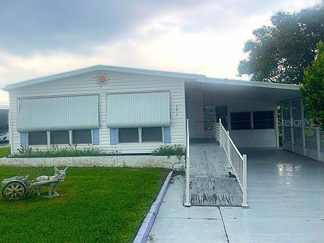 **SELLER MOTIVATED***!** Nestled in the welcoming 55+ community of Twin Fountains in Lake Wales, this well-maintained manufactured home sits on your own land and is ready for its next owner. There is an additional bonus room that can be converted to a third or guest bedroom or office. This home offers a comfortable and affordable living experience in a community designed for an active and social lifestyle. With a low HOA of just $180 a month, residents enjoy wonderful amenities, including a heated community pool, clubhouse, and more, all while having essential utilities such as cable, water, sewer, internet, and lawn care included. Unlike many communities, there is NO lot rent, making this an exceptional value.