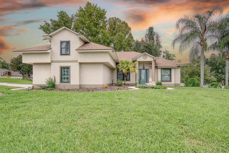 Photo of 10537 Versailles Boulevard, Clermont, FL 34711 (MLS # O6431254)