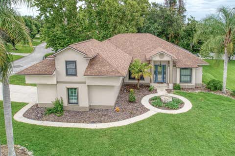 Photo of 10537 Versailles Boulevard, Clermont, FL 34711 (MLS # O6431254)